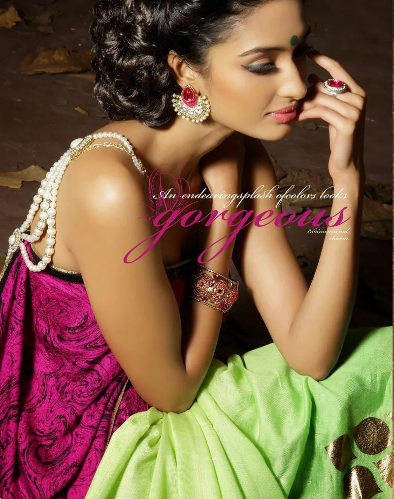 MTkwODA=/mediabank/images/products/CharmingPurpleLiteGreenColorwithBlackPurpleShinyBorderGoldLeafPrintQueenDesignerSarees1621527685_19080.webp