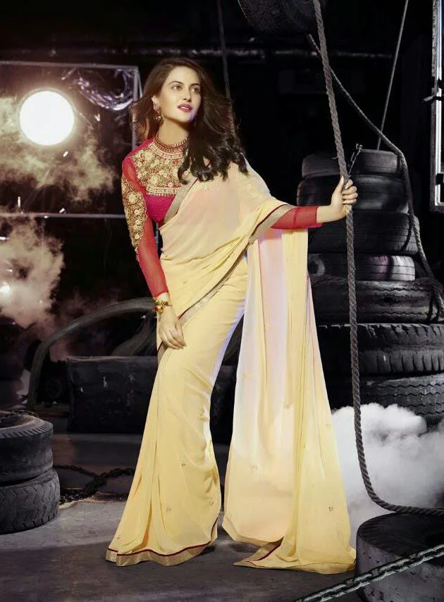 MTkwODA=/mediabank/images/products/CreamColorPlaneZariredBorderEliteDesignersarees1957649711_19080.webp