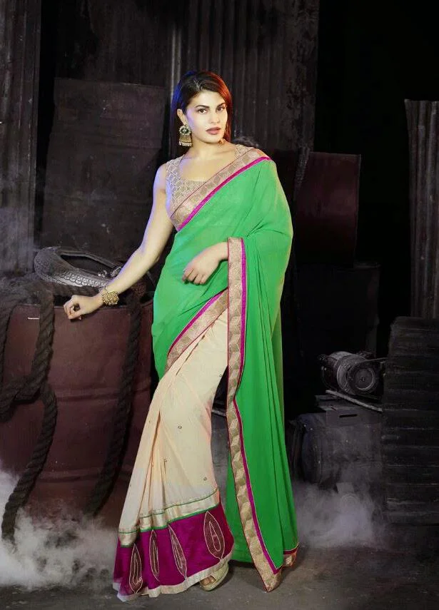 MTkwODA=/mediabank/images/products/CreamGreenColorWithZariBorderPurpleEmbroideryFlowerBorderFashionEliteDesignersarees1676921441_19080.webp