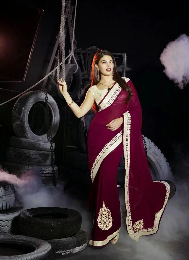 MTkwODA=/mediabank/images/products/MaroonColorWithZariBorderwithZariEmbroiderypatchFineEliteDesignersarees1191658650_19080.webp