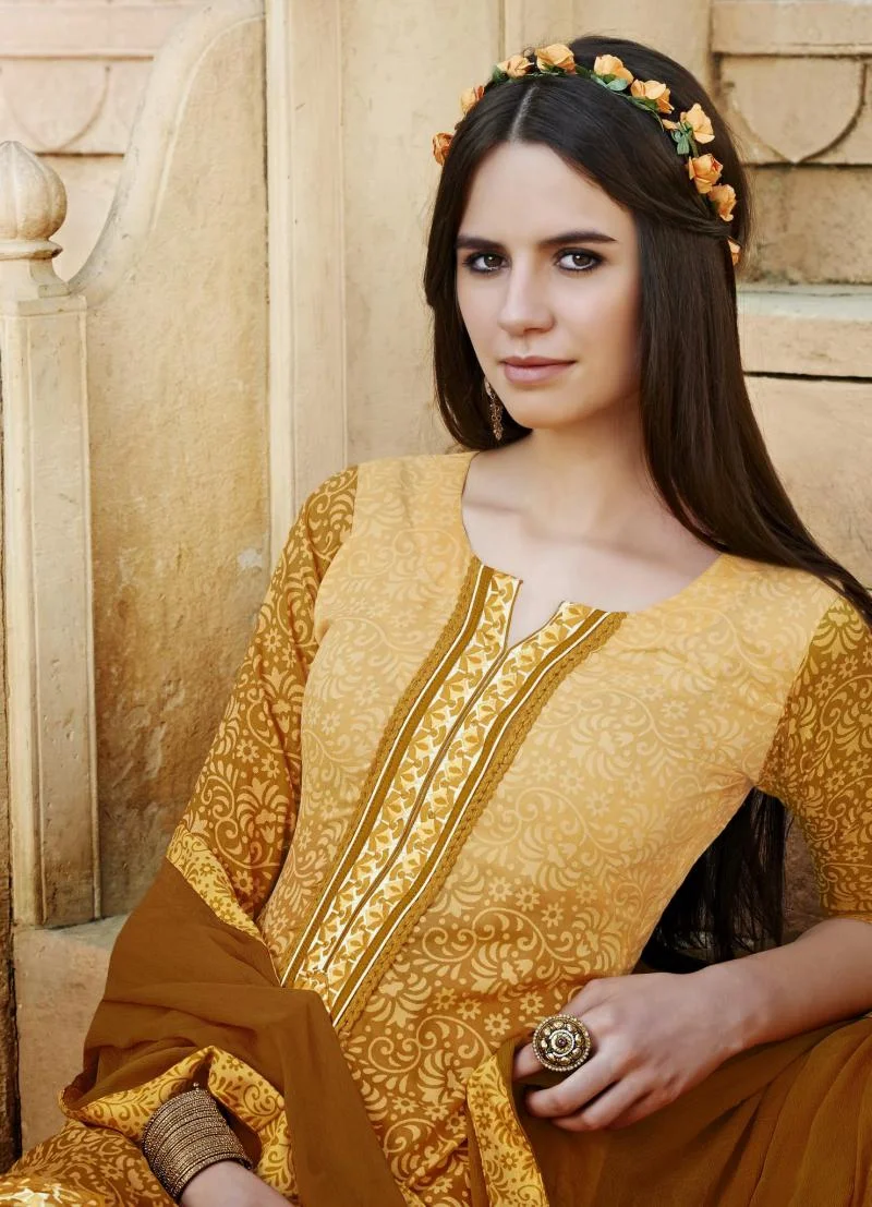 MTkwODA=/mediabank/images/products/NewGoldenrodColorselfDesignWithBottomNeckEmbroiderydesignSemiStitchSalwarKameez2067615315_19080.webp