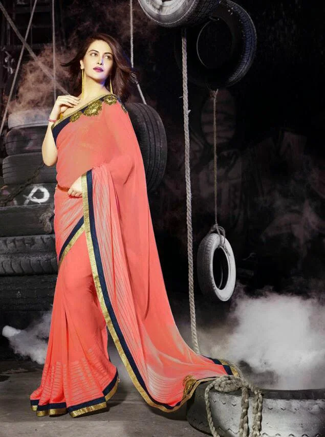 MTkwODA=/mediabank/images/products/SalmonColorzariBlueLaceBorderFashionwearEliteDesignersarees1524141598_19080.webp