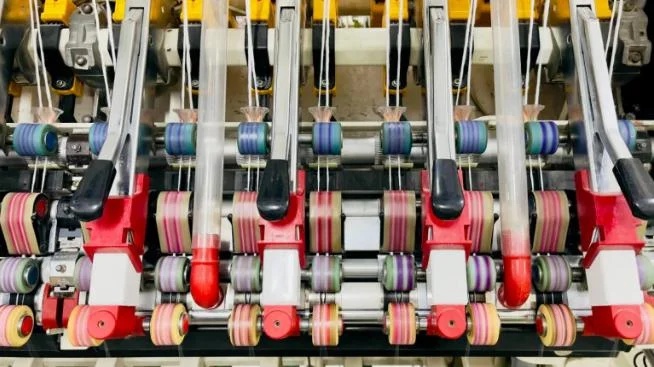 Twin Twist Compact Yarn with Suction Spinning for Textile Applications