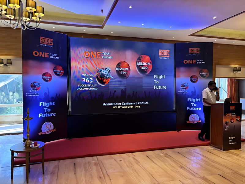 Thematic Conference Backdrop Design For Annual Corporate Meetings