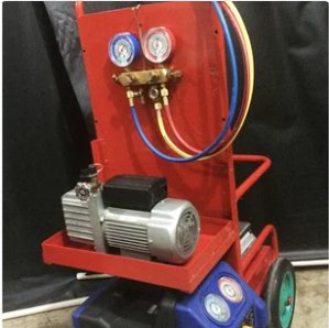Refrigerant recovery evacuating and charging unit for HVAC